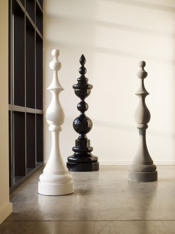 The Fine Art of Curation: Displaying Collections with Elegance 2 Check Mate Sculpture Gray Finish